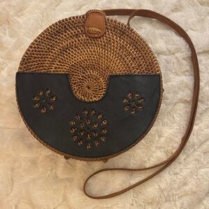 Round Woven Crossbody Bag with Black Accents